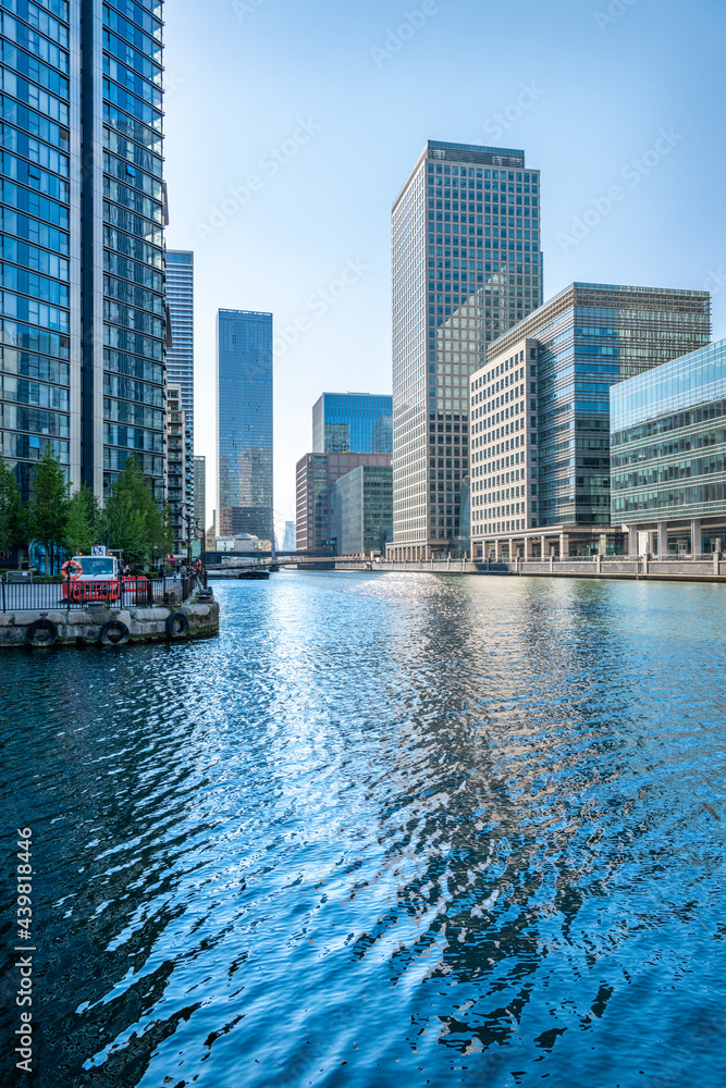 Fototapeta premium Buildings around South Dock in Dockland on the Isle of Dogs, London, UK
