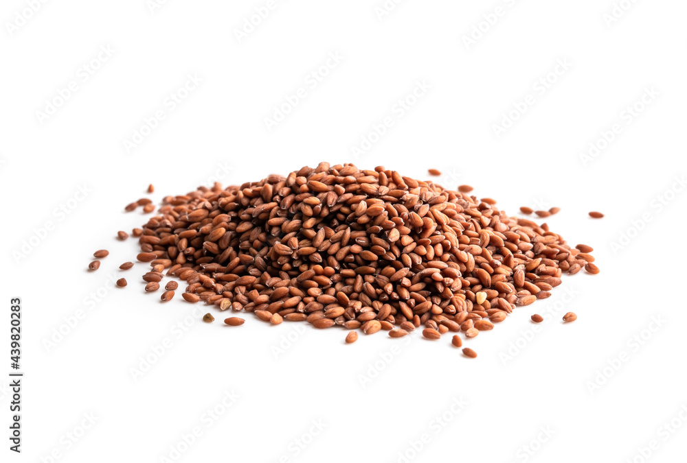 Pile of cress plain seeds isolated on white ready to plant Pile of cress plain seeds isolated on white ready to plant