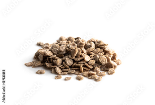 Pile of tomato seeds isolated on white ready to plant