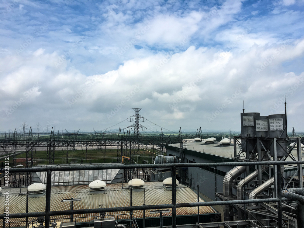 Heat recovery steam generator and sky in Combined-Cycle Co-Generation Power Plant which it so beautiful and popular to background power plant concept. Heat recovery steam generator and sky in Combined-Cycle Co-Generation Power Plant which it so beautiful and popular to background power plant concept.