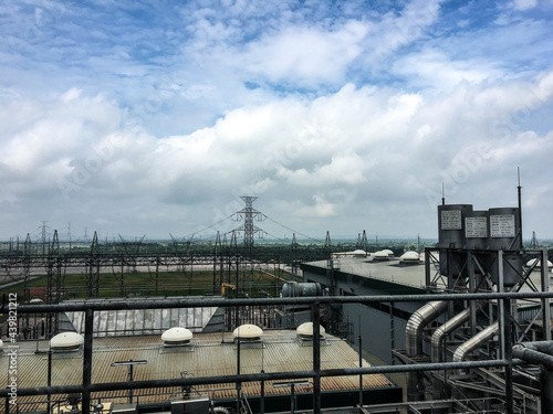 Heat recovery steam generator and sky in Combined-Cycle Co-Generation Power Plant which it so beautiful and popular to background power plant concept. © chinnawat