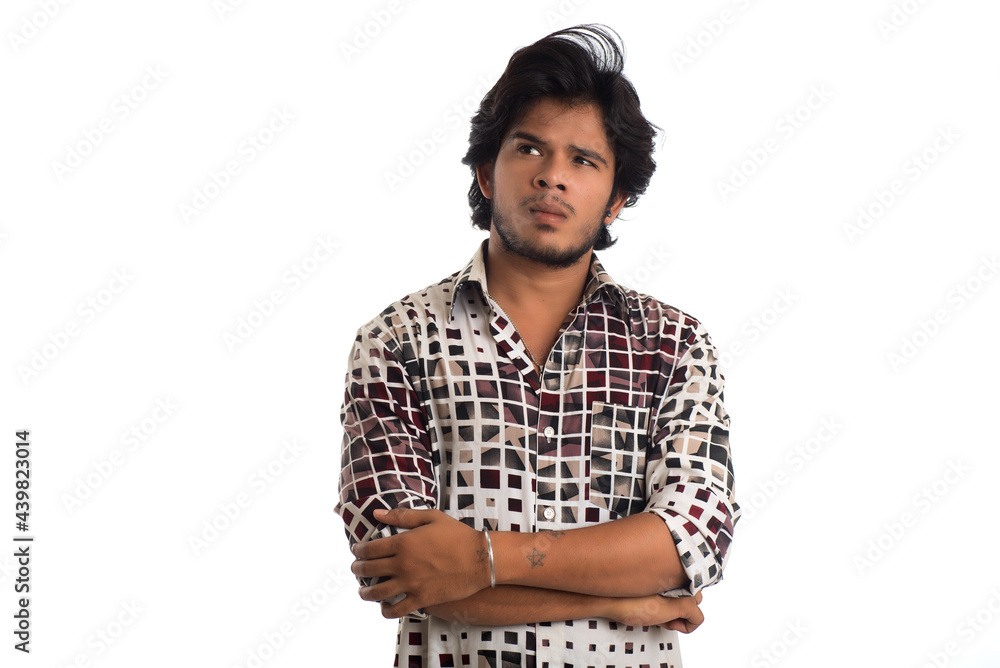 Young man posing on a white background