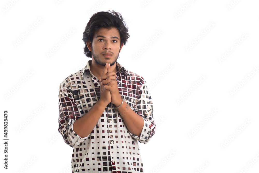 Young man posing on a white background Young man posing on a white background