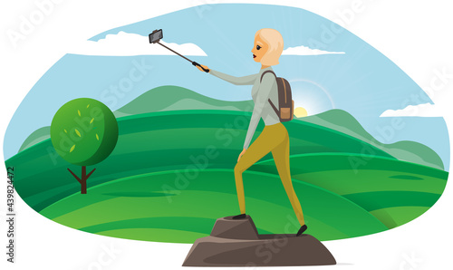 Happy climber reached summit of mountain. Traveling and technology concept. Lady with smartphone is posing for photo on peak. Woman taking selfie on mountain. Girl is photographed while traveling