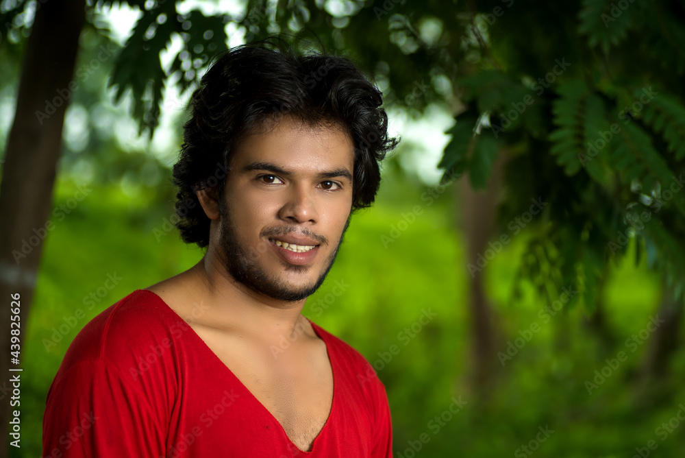 Handsome fashion young man posing outdoors Handsome fashion young man posing outdoors