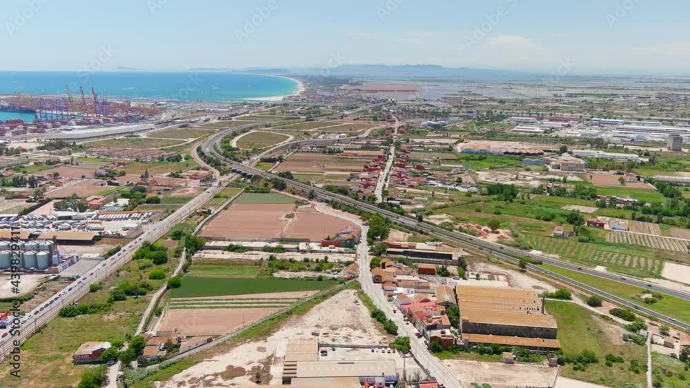Valencia: Aerial view of famous city in Spain, city harbor and clear waters of Mediterranean Sea - landscape panorama of Europe from above Valencia: Aerial view of famous city in Spain, city harbor and clear waters of Mediterranean Sea - landscape panorama of Europe from above
