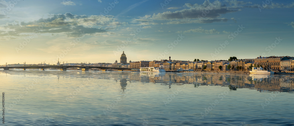 Large-format panorama of St. Petersburg against the background of the Neva River at dawn