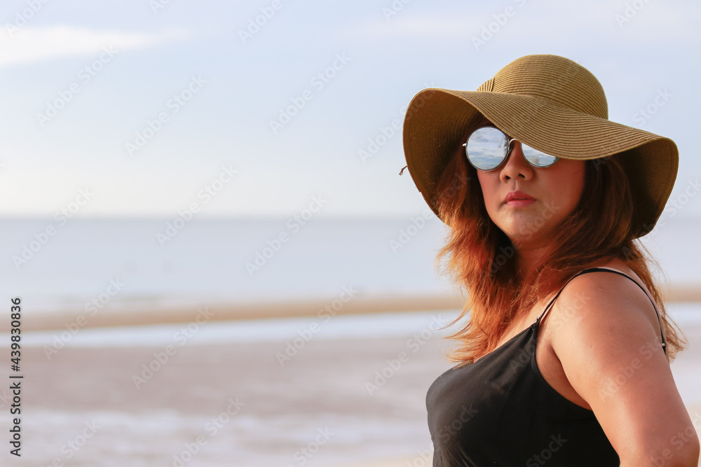 Portrait of young asian women at beautiful beach. Travel on vacation in summer season. Enjoy with holidays in tropical island. Portrait of young asian women at beautiful beach. Travel on vacation in summer season. Enjoy with holidays in tropical island.