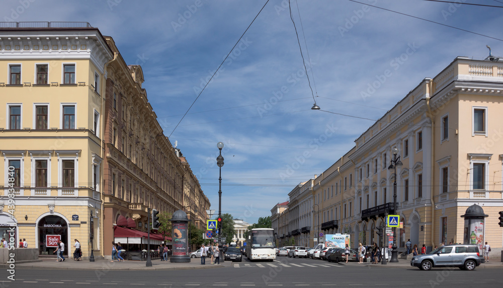  Nevsky Avenue with moving on it pedestrians and cars
