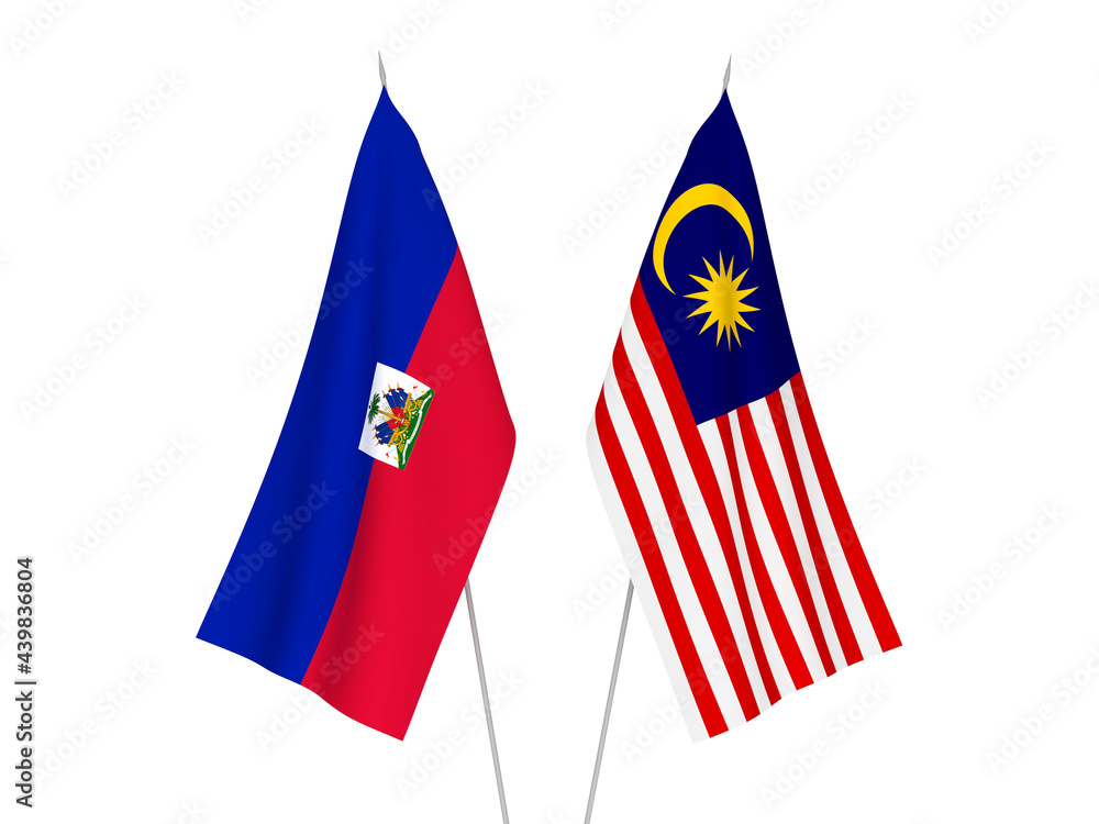 National fabric flags of Malaysia and Republic of Haiti isolated on white background. 3d rendering illustration.