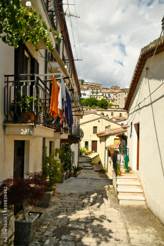 Muro Lucano, Italy, June 12, 2021. A narrow street among the old houses of a medieval village in the Basilicata region.