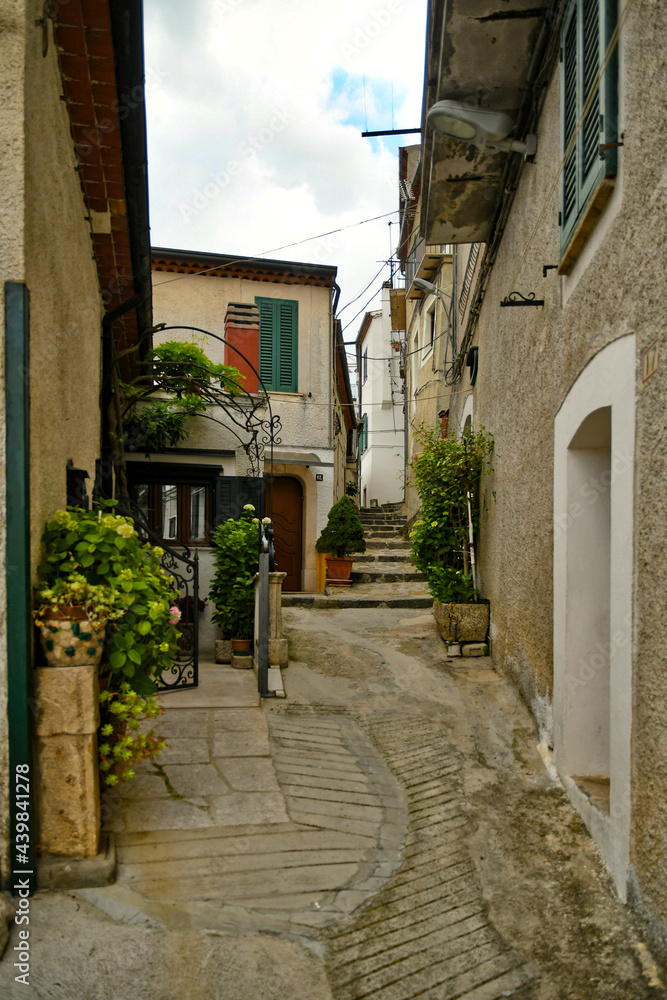 Muro Lucano, Italy, June 12, 2021. A narrow street among the old houses of a medieval village in the Basilicata region. Muro Lucano, Italy, June 12, 2021. A narrow street among the old houses of a medieval village in the Basilicata region.
