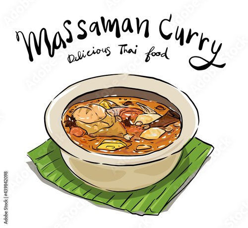 A Chicken Massaman Curry in crockery on banana leaf isolated white background. Massaman Curry is a Thai Cuisine dish with chicken meat, potato, onion, and many spices.