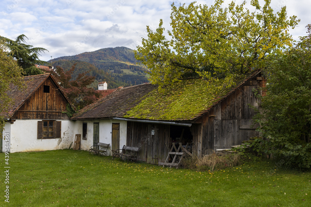 Old farmhouses in Alpine village with mountain view Old farmhouses in Alpine village with mountain view