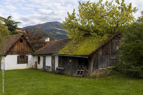Old farmhouses in Alpine village with mountain view