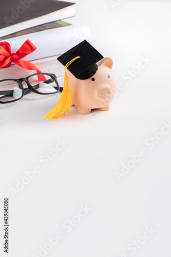 Design concept of new graduate trying to find a job and saving money. photo
