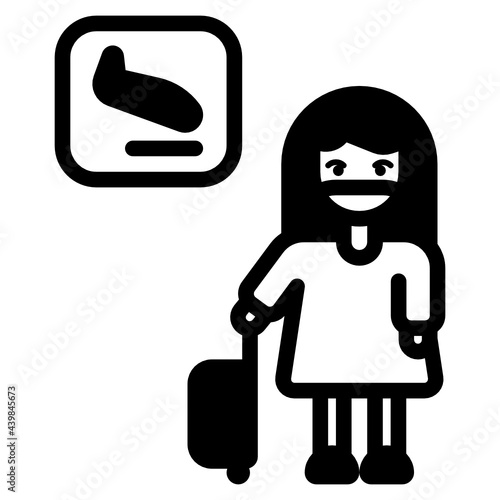 A woman in arrival hall at the airport of new normality