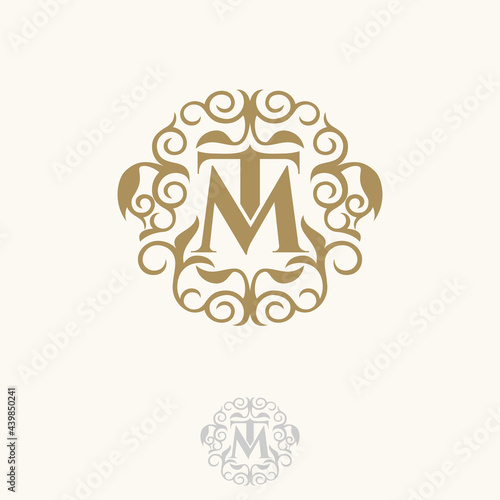 Initial TM letter with floral for your best business symbol