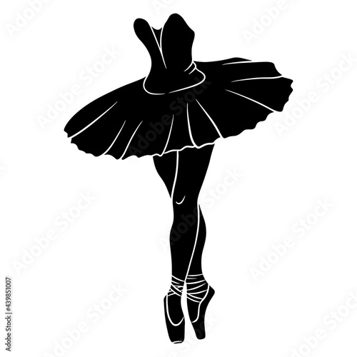 Ballet. Ballerina's legs in a tutu and pointe. Silhouette.