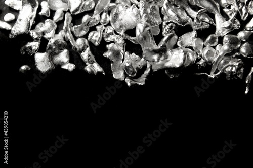 Pure silver nuggets on black background  photo