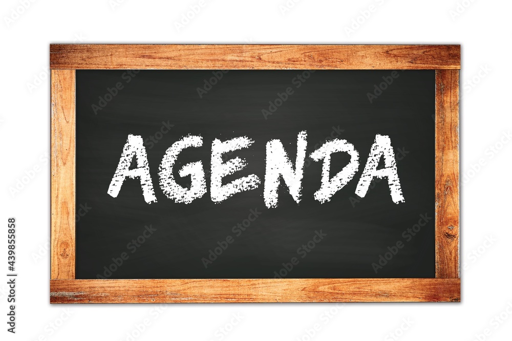 AGENDA text written on wooden frame school blackboard. AGENDA text written on wooden frame school blackboard.