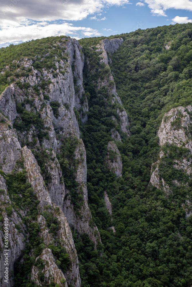 Steep rocky cliffs of Lazar's Canyon / Lazarev kanjon, the deepest and longest canyon in eastern Serbia, near the city of Bor