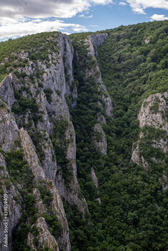 Steep rocky cliffs of Lazar's Canyon / Lazarev kanjon, the deepest and longest canyon in eastern Serbia, near the city of Bor