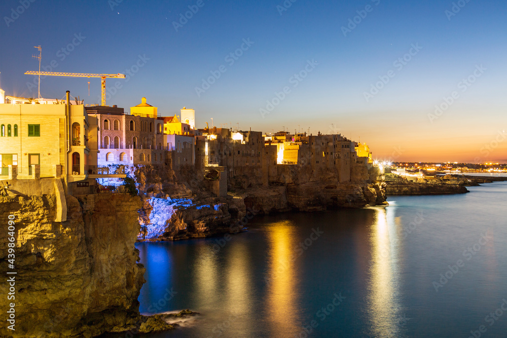 Polignano at sea at night, Immediately after sunset, a village by the sea in Bari in Puglia