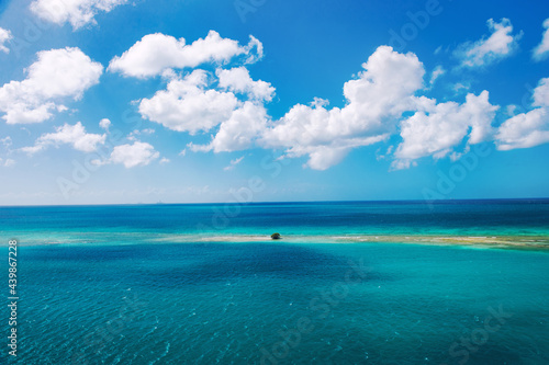 Beautiful turquoise sea perfect blue sky white clouds