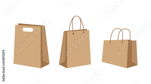 Paper shopping bag set. Environmentally friendly biodegradable bags. Brown paper packaging on white background. Buying groceries and other products. Ethical consumerism. Vector illustration, clip art.