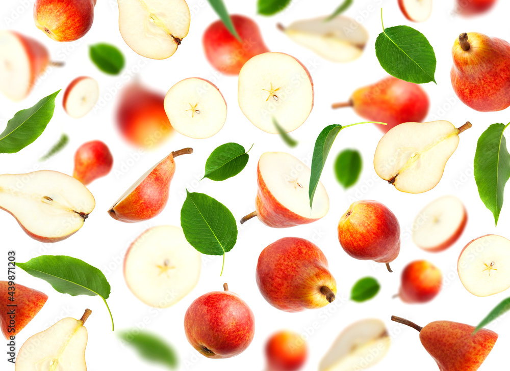 Flying red ripe juicy pear and green leaves isolated on white background. Sweet whole pears and sliced. Summer healthy organic fruits, harvesting. Creative composition with pears. Food concept Flying red ripe juicy pear and green leaves isolated on white background. Sweet whole pears and sliced. Summer healthy organic fruits, harvesting. Creative composition with pears. Food concept