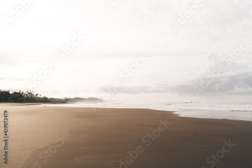 Magnificent untouched sandy beach of powerful ocean