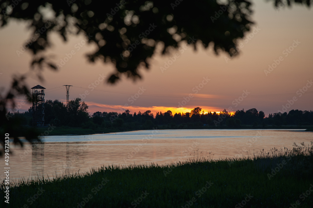 Watching the sunset from the bank of the Lielupe in Jelgava / Saulriets pie Lielupes