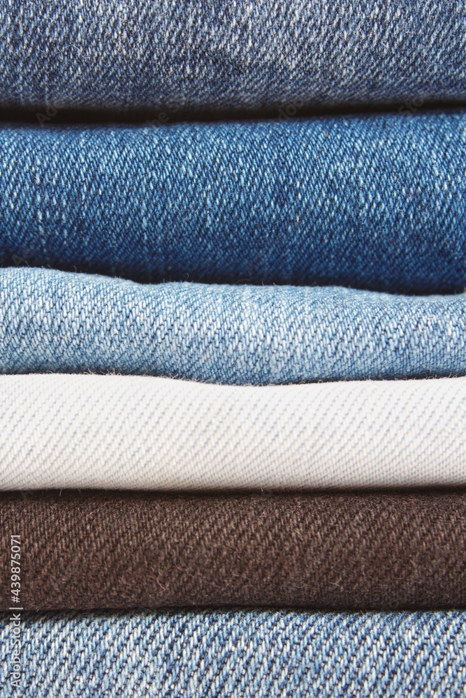 Stack of jeans, denim jeans texture story background. Stack of jeans, denim jeans texture story background.