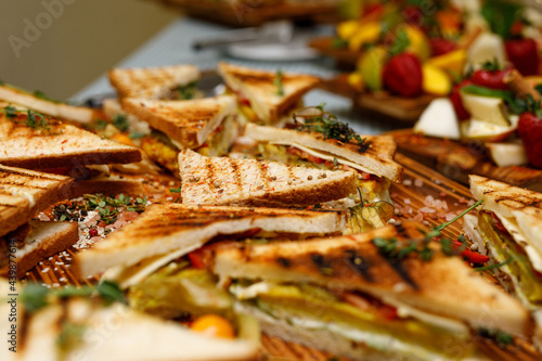 Εκτύπωση καμβά Club sandwich panini with chicken at a catered event