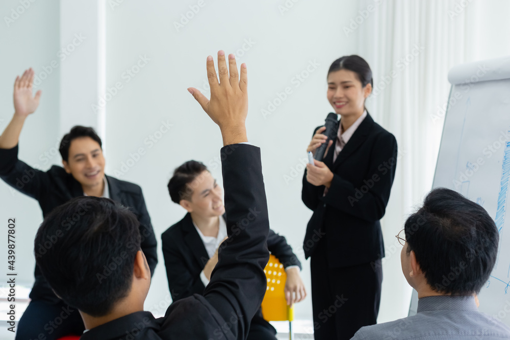 business person showing hand up for presentation in meeting room seminar training. question meeting concept. business person showing hand up for presentation in meeting room seminar training. question meeting concept.