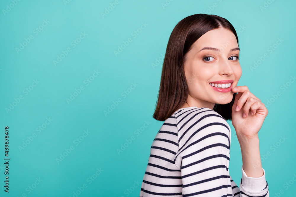 Fototapeta premium Photo of coquette dream lady beaming white smile finger chin wear striped shirt isolated on turquoise background