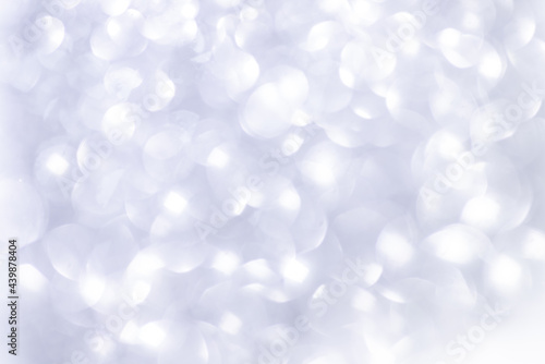 white, silver glitter vintage lights background defocused for festivals and celebrations