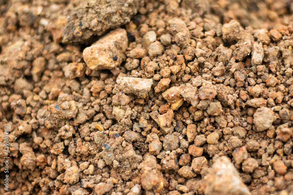 ground with brown pebbles as background ground with brown pebbles as background