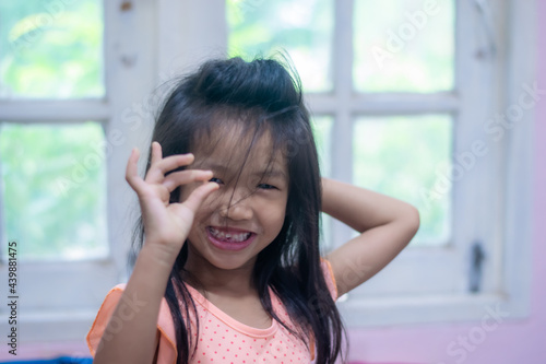 A 5-year-old Asian girl broke her first tooth.