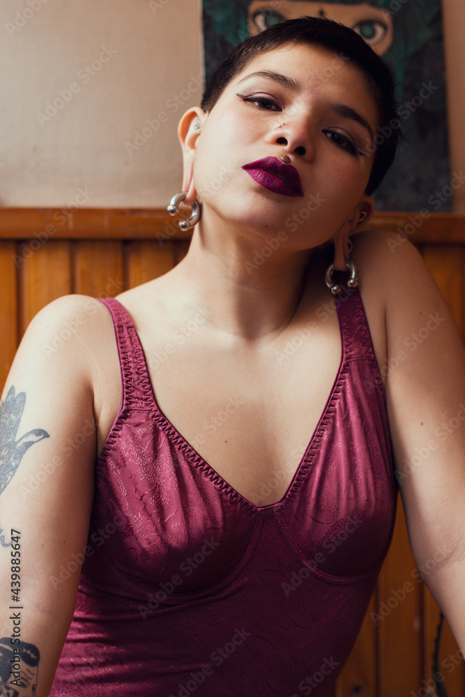 © Soledad Kubat/Stocksy - Portrait of young woman with tattoos © Soledad Kubat/Stocksy - Portrait of young woman with tattoos