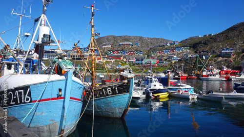 fishing boats in the harbor, Picturesque harbor with colorful houses and fishing boats, Qaqortoq, Greenland