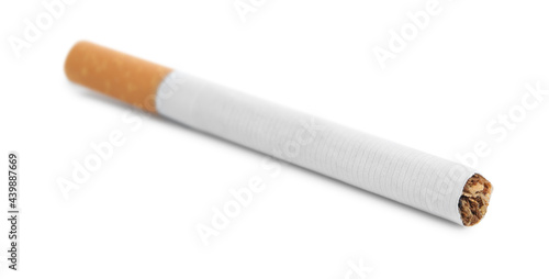 Cigarette with orange filter isolated on white