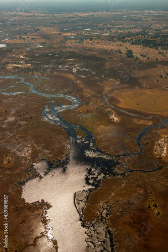Aerial view of a small part of the Okavango Delta in northern Botswana, Africa. All the water reaching the delta is ultimately evaporated and transpired and does not flow into any sea or ocean. photo