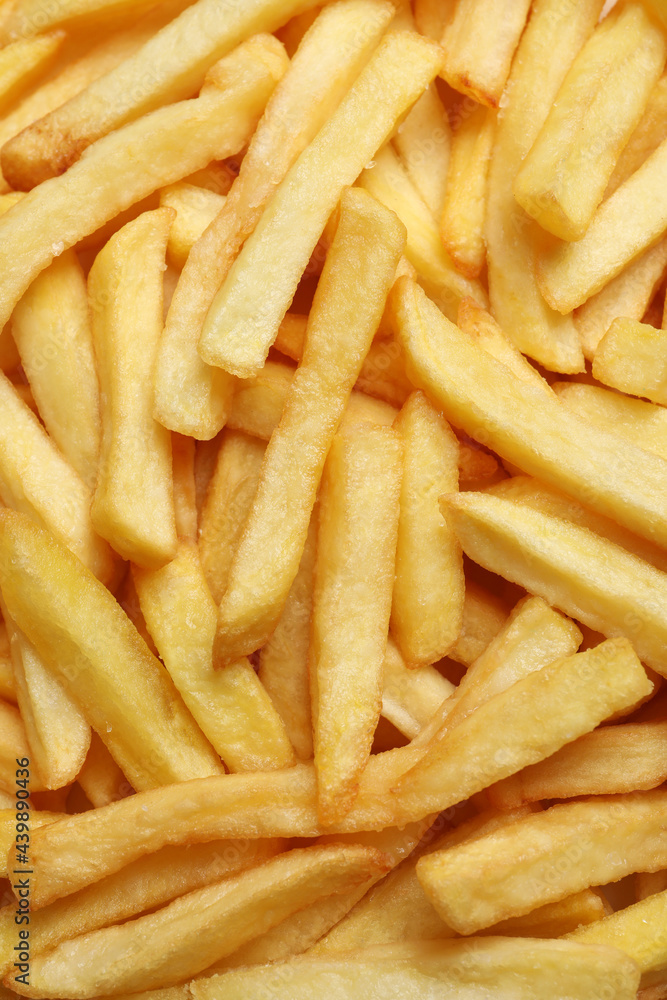 Yummy French fries as background, top view Yummy French fries as background, top view