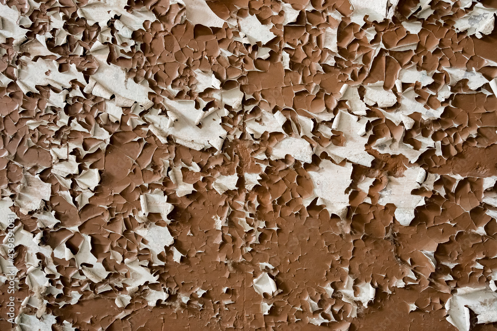 Ruined paint on a wall background Ruined paint on a wall background