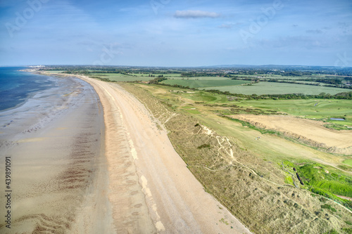 Aerial view of West Beach at Littlehampton with the sand dunes protecting the links golf course and the beautiful West Sussex countryside.