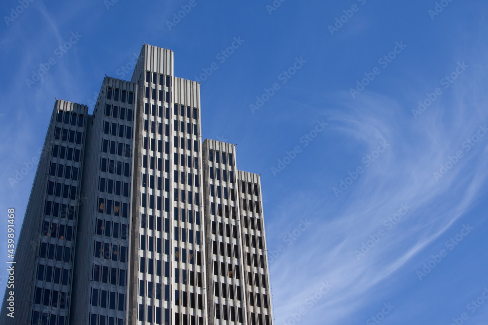 Office buildings in the city against blue sky