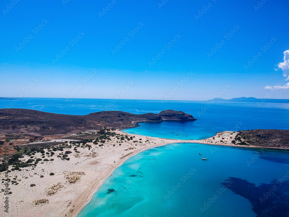 Aerial view of Simos beach in Elafonisos island in Greece. Elafonisos is a small Greek island the Peloponnese with idyllic exotic beaches and crystal clear waters. Laconia, Greece, Europe