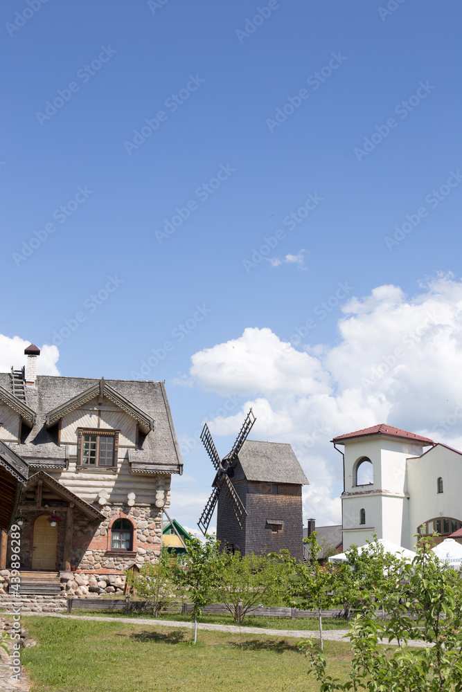 Large windmill against a bright blue sky Large windmill against a bright blue sky